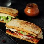 Delicious turkey sandwich assembled with turkey breast, cranberry, fresh tomatoes, lettuce, Havarti cheese and chipotle pecan pesto. Ready in 15 minutes!