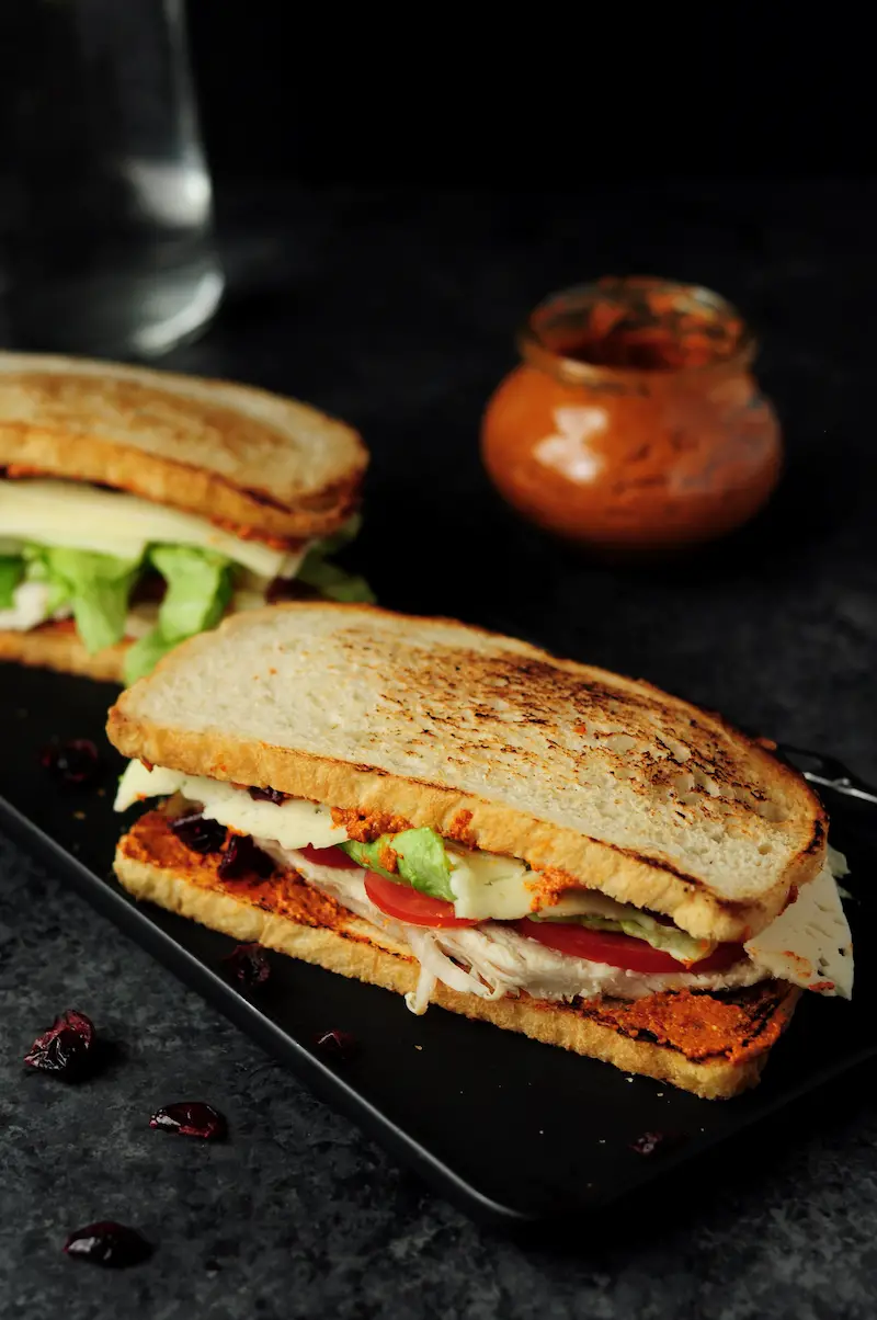 Delicious turkey sandwich assembled with turkey breast, cranberry, fresh tomatoes, lettuce, Havarti cheese and chipotle pecan pesto. Ready in 15 minutes!