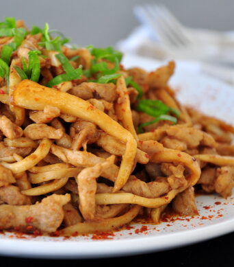 Marinated pork with mushrooms sautéed in a sweet and sour sauce with a spicy kick. Super flavorful and great with rice.