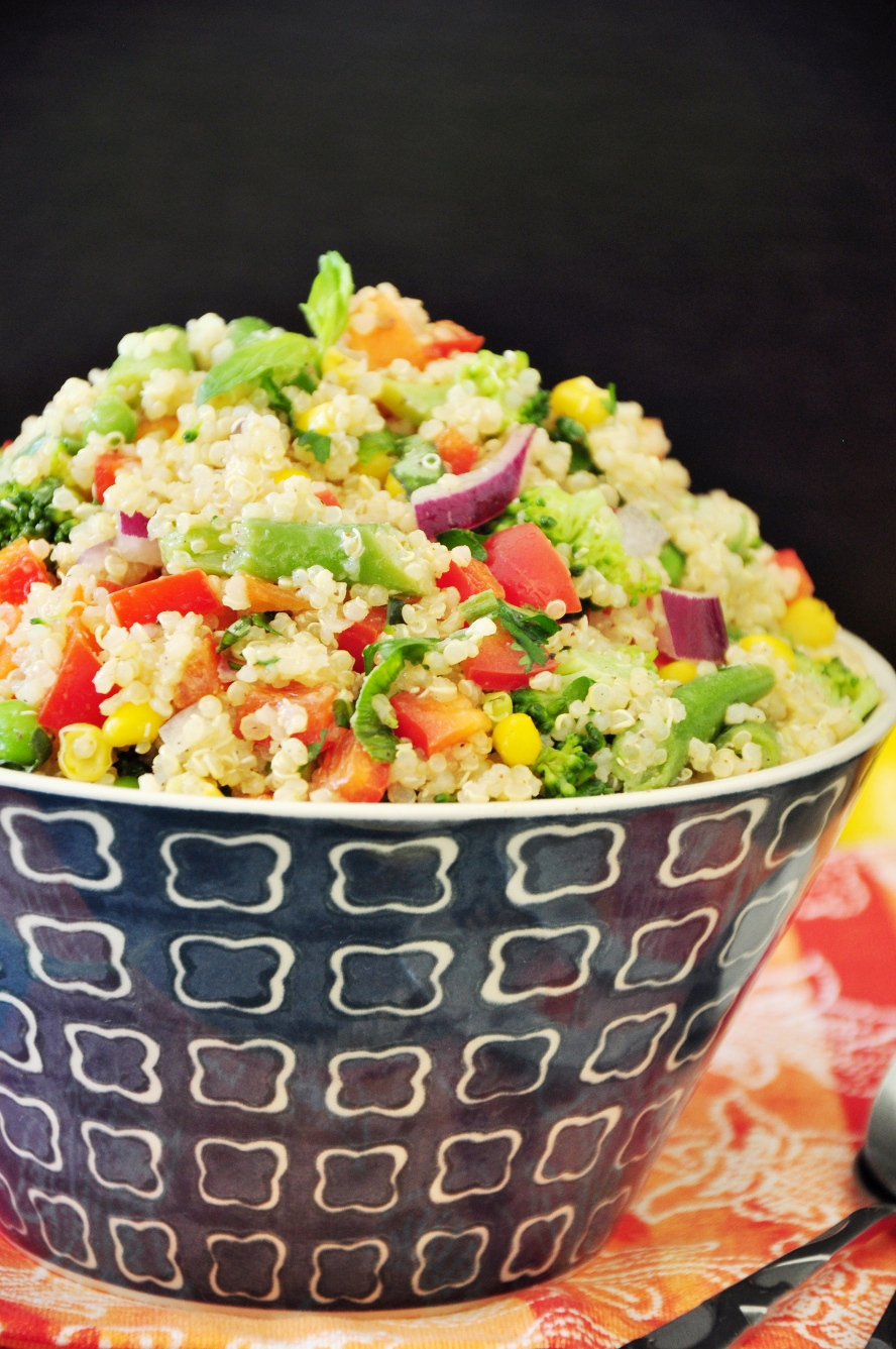 Packed with a variety of vegetables and herbs along with a simple & delicious lemon Dijon dressing, this vegan quinoa bowl is rich in flavor and nutrients.