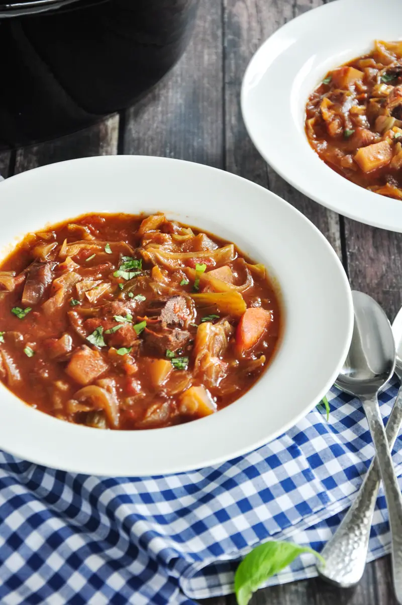 A healthy Shanghai-style borscht recipe made with tomatoes, beef stew meat, and onion sauteed in a roux and slow cooked in beef bone broth. This beef borscht is the perfect comfort food on a chilly day.