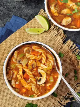 30-min chicken soup recipe loaded with vegetables. Add some noodles to transform it into a hearty chicken noodle soup. A slow cooker recipe is included. 