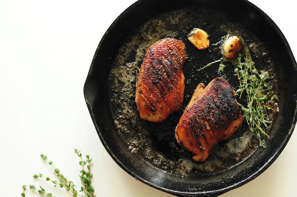 Adding garlic when searing sous vide duck breasts