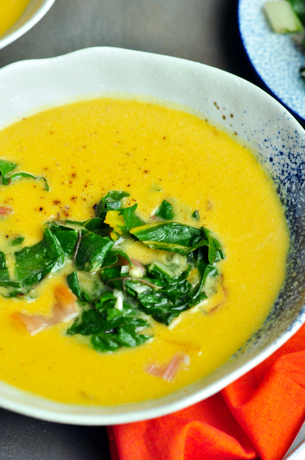 Creamy sous vide butternut squash soup with an earthy touch of sautéed Swiss chard that you can't stop eating.