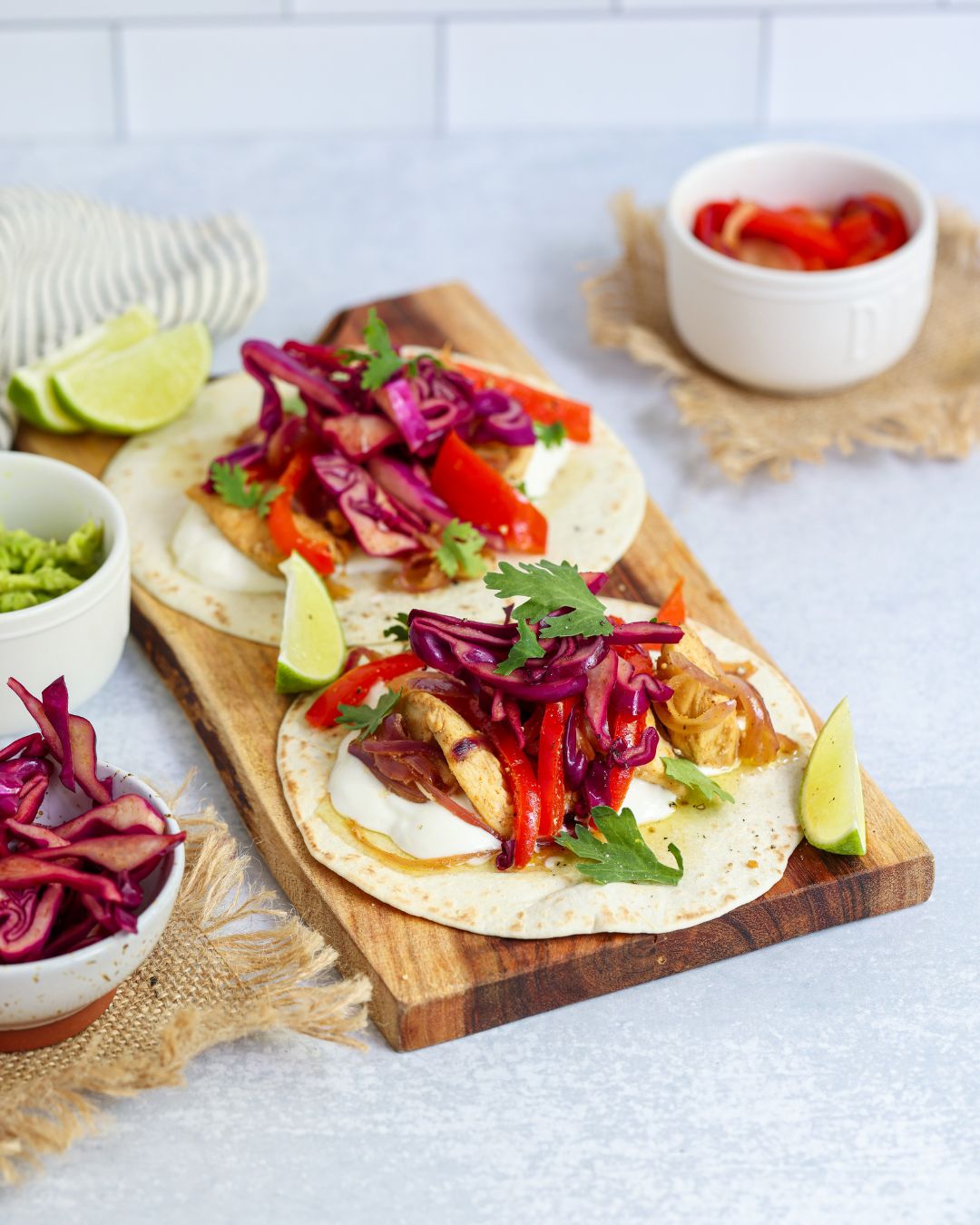 These quick Chicken Fajita Tacos come together in 30 minutes with a stovetop method or pre-cooked sous vide chicken for an even faster meal.