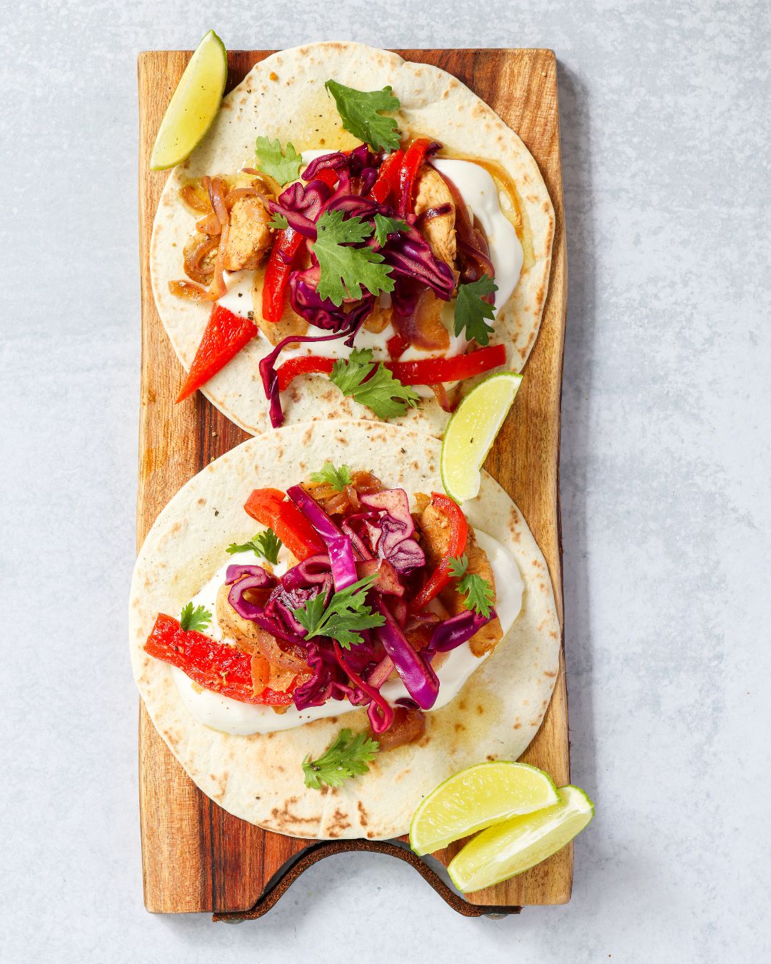 These quick Chicken Fajita Tacos come together in 30 minutes with a stovetop method or pre-cooked sous vide chicken for an even faster meal.