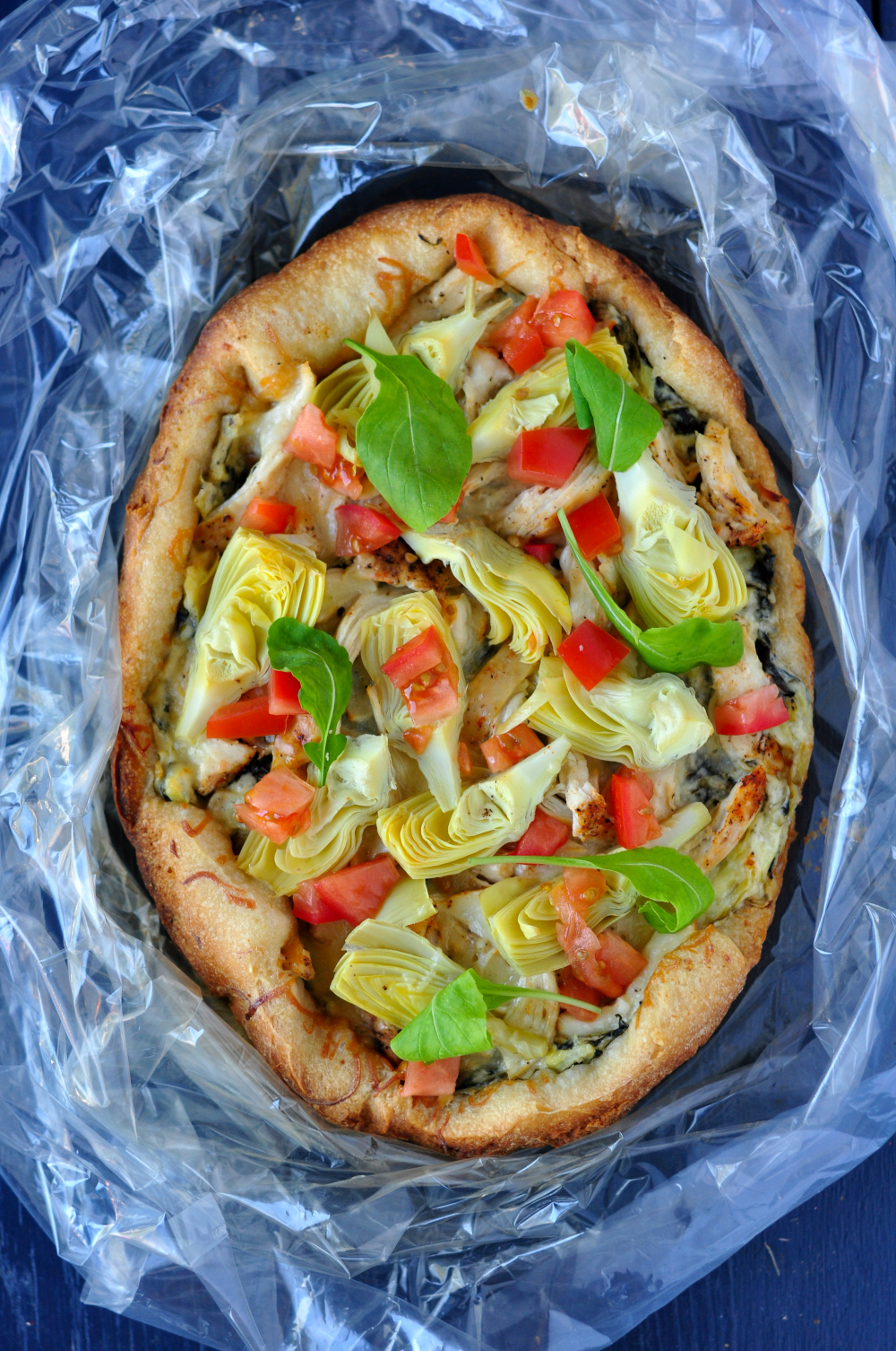Chicken Florentine pizza in a slow cooker liner
