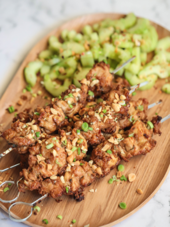 Chicken satay skewers marinated in a bold peanut, garlic, and ginger sauce, then grilled to smoky perfection. An easy weeknight or party favorite.