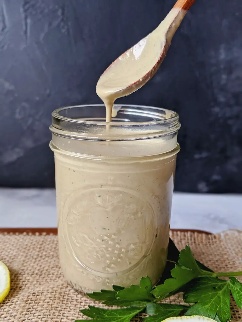 This gluten-free and sugar-free tahini dressing is creamy, savory, nutty, and ready in five minutes. Drizzle it on salads and Buddha bowls, or toss with pasta for a healthy treat.