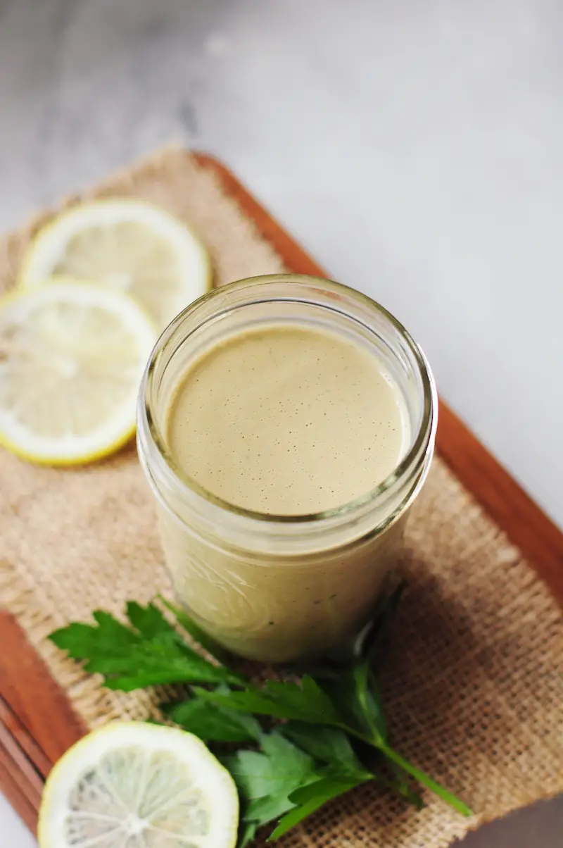 This gluten-free and sugar-free tahini dressing is creamy, savory, nutty, and ready in five minutes. Drizzle it on salads and Buddha bowls, or toss with pasta for a healthy treat.