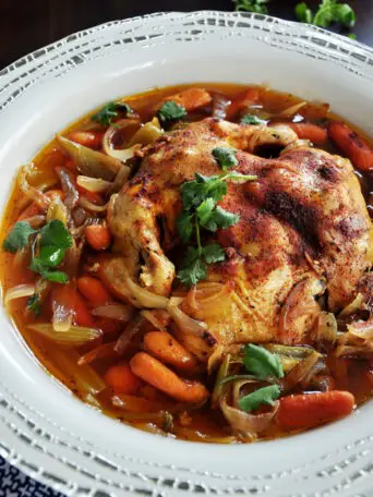 Juicy and tender, this crockpot whole chicken recipe over-delivers on flavor and only requires 10 minutes of hands-on time. Ideal for holidays or casual weeknights.