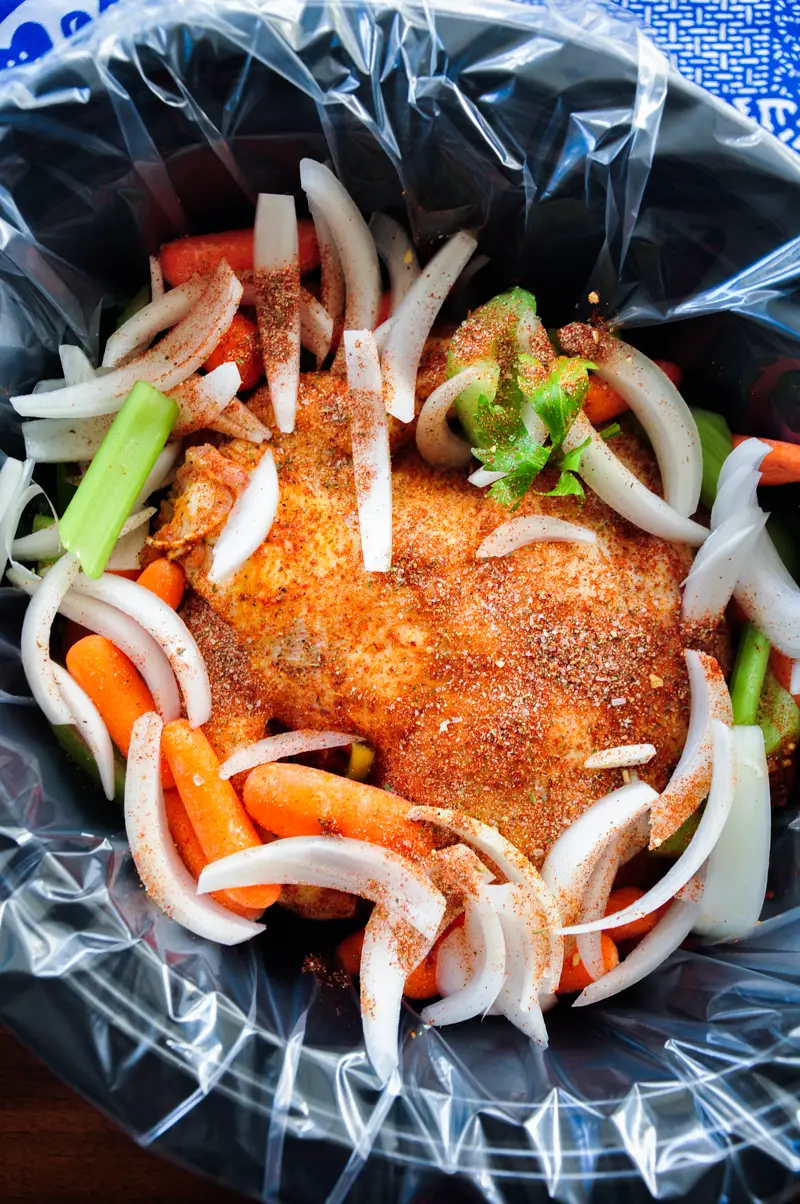 Juicy and tender, this crockpot whole chicken recipe over-delivers on flavor and only requires 10 minutes of hands-on time. Ideal for holidays or casual weeknights.