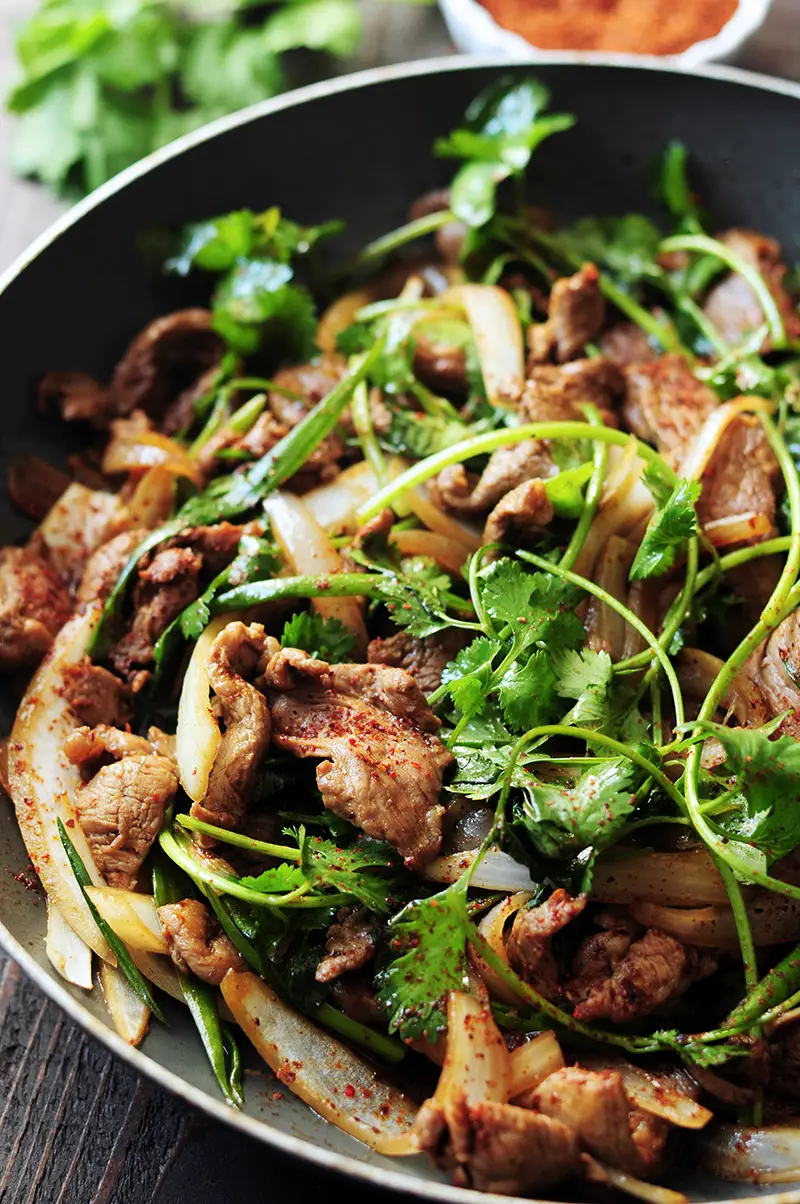 This authentic Chinese cumin lamb recipe takes less than 30 minutes to put together. It might just become your go-to lamb recipe after you try it.