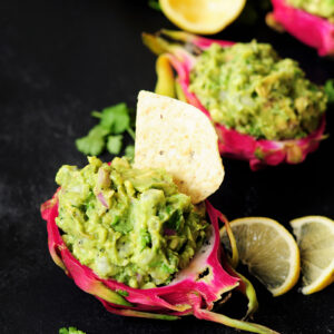 Surprise and delight your taste buds by combining dragon fruit with creamy avocado for a refreshing guacamole served individually in a dragon fruit shell.