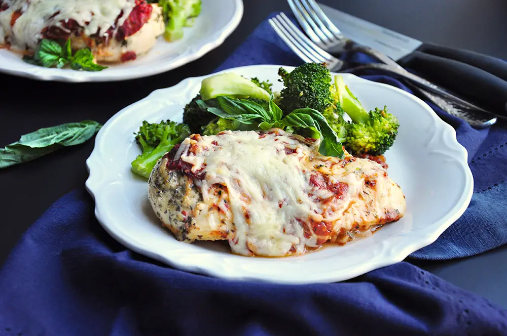 Craving comfort food? This baked chicken parmesan recipe is a quicker, healthier, and equally tasty version of the traditional dish you know and love. 