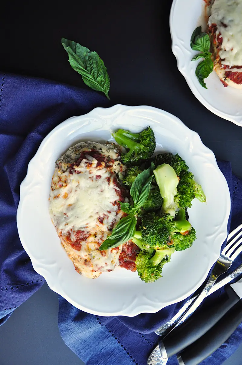 Craving comfort food? This baked chicken parmesan recipe is a quicker, healthier, and equally tasty version of the traditional dish you know and love. 