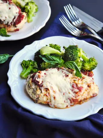 Craving comfort food? This baked chicken parmesan recipe is a quicker, healthier, and equally tasty version of the traditional dish you know and love. 