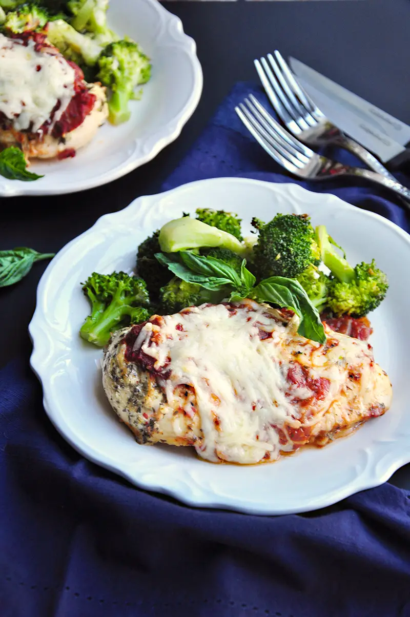 Craving comfort food? This baked chicken parmesan recipe is a quicker, healthier, and equally tasty version of the traditional dish you know and love. 