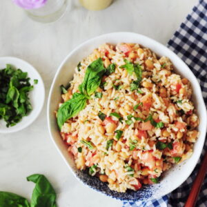 Use your leftover rice to make this light and refreshing beans and rice side dish. It's protein-packed, gluten-free, and ready in ten minutes.