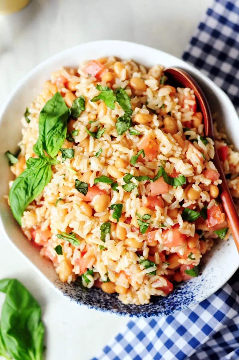 Use your leftover rice to make this light and refreshing beans and rice side dish. It's protein-packed, gluten-free, and ready in ten minutes.