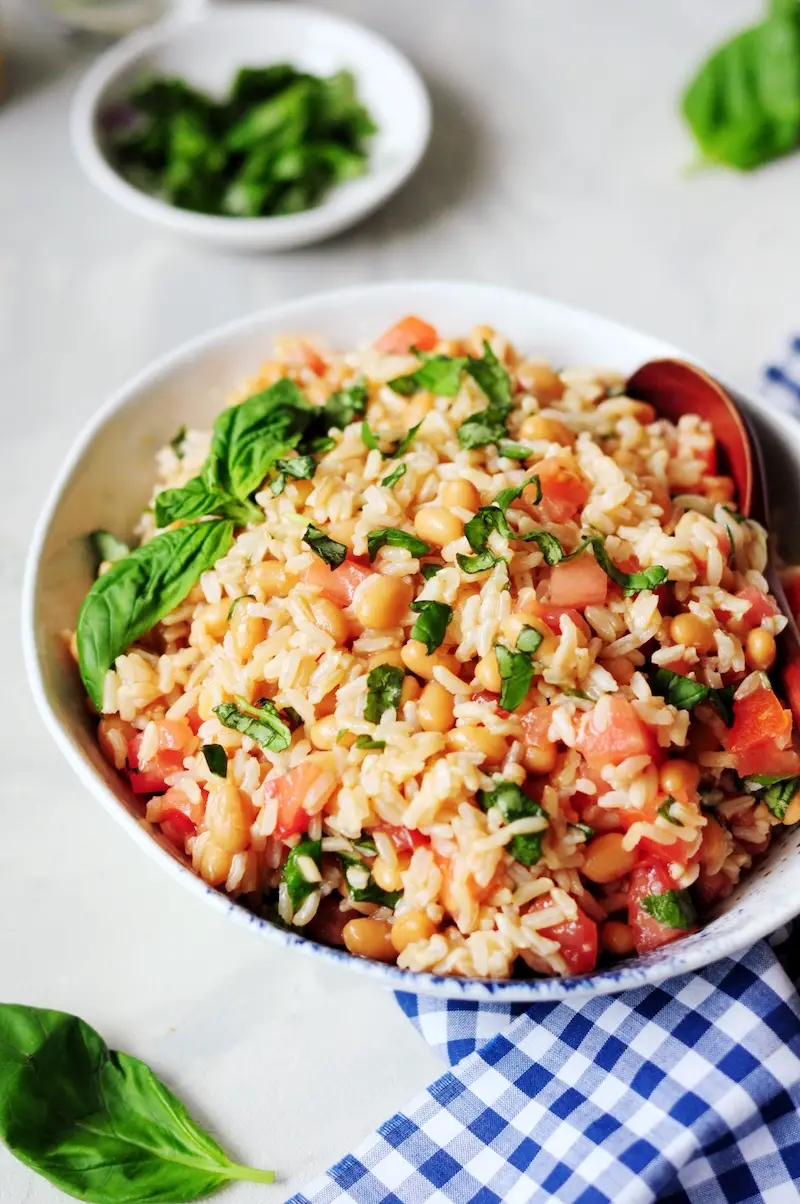 Use your leftover rice to make this light and refreshing beans and rice side dish. It's protein-packed, gluten-free, and ready in ten minutes.