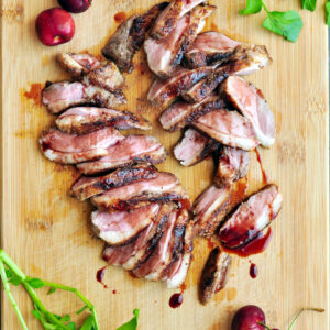 Perfect sous vide duck breast seasoned with fragrant five-spice with ginger and garlic, then served with a luscious and tangy cherry sauce.