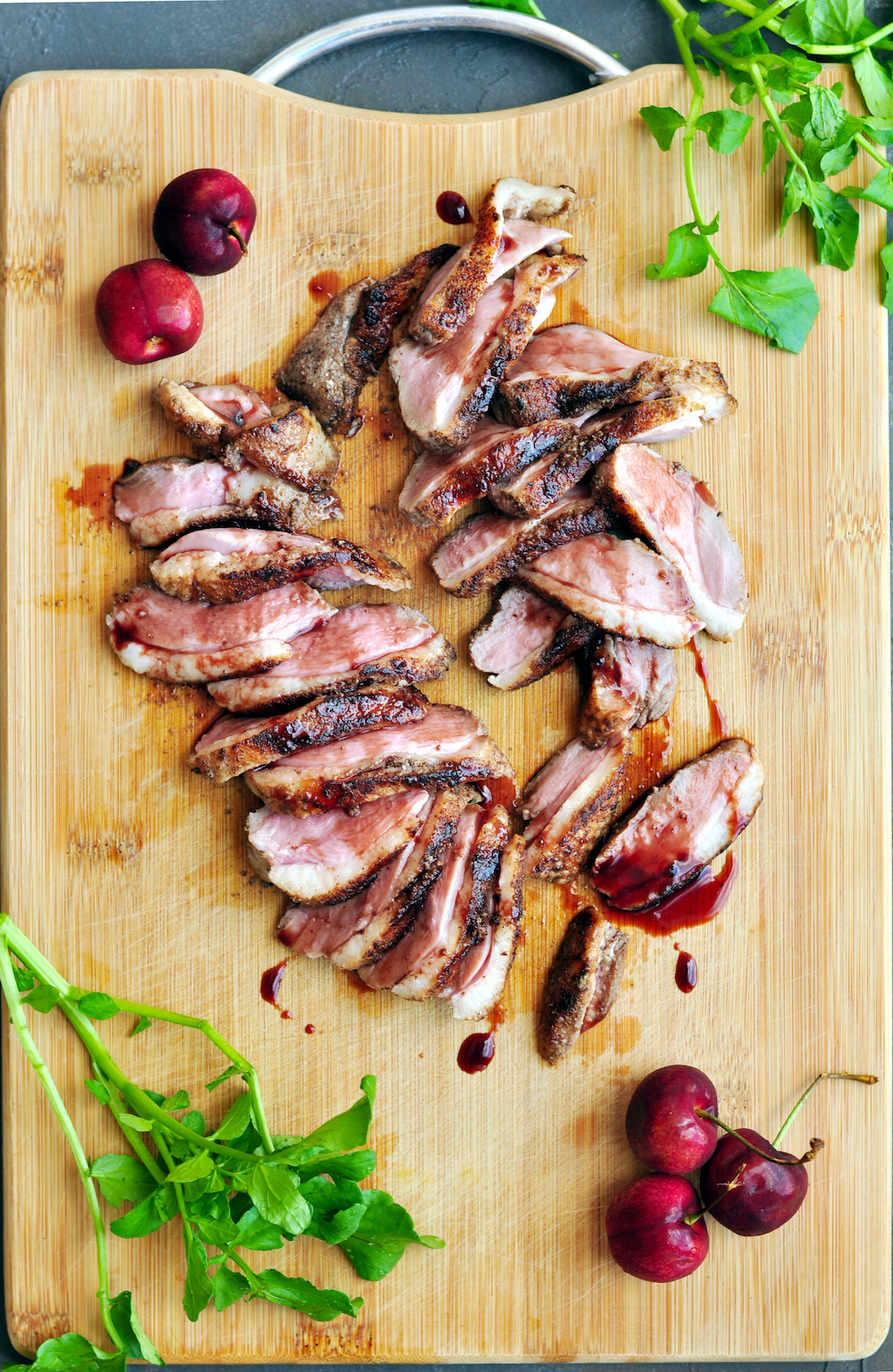 Perfect sous vide duck breast seasoned with fragrant five-spice with ginger and garlic, then served with a luscious and tangy cherry sauce.