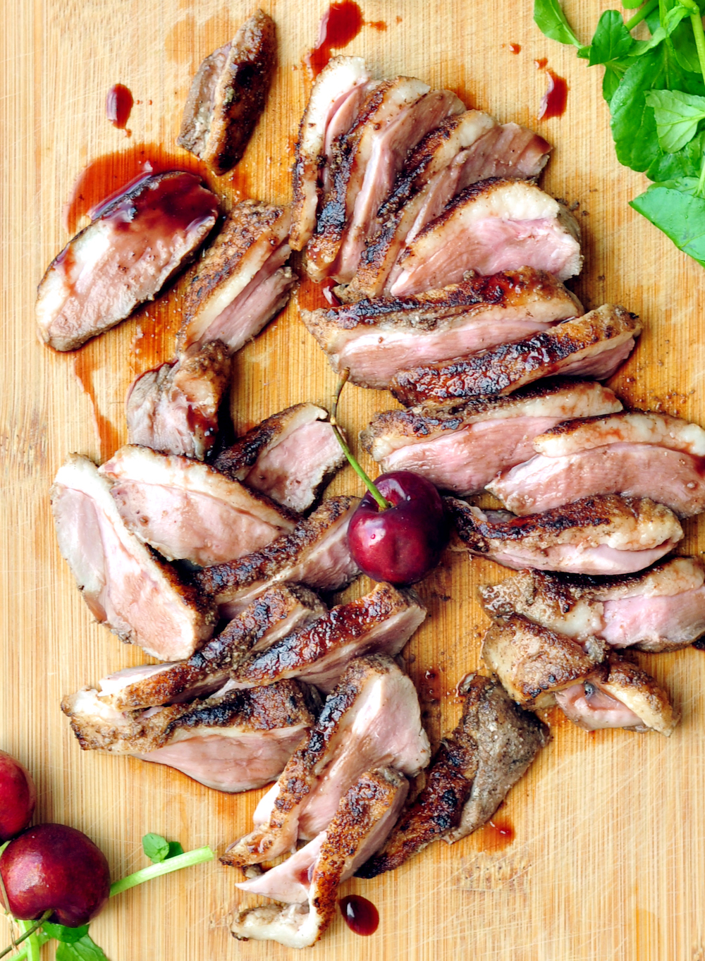 Perfect sous vide duck breast seasoned with fragrant five-spice with ginger and garlic, then served with a luscious and tangy cherry sauce.