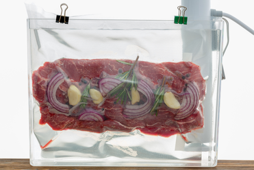 https://www.streetsmartkitchen.com/wp-content/uploads/Flank-Steak-in-a-Sous-Vide-Water-Bath.png?ezimgfmt=rs:372x248/rscb1/ngcb1/notWebP