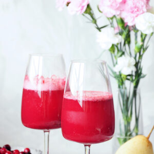 This fresh pear and cranberry mocktail is healthy, full of flavor, and lower in sugar than most fruity drinks. Perfect for the holidays or girls’ nights in.