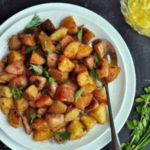 Crispy-skinned sous vide potatoes cooked with garlic-infused oil and smoked paprika. In the unlikely event that you have leftovers, think potato salad.