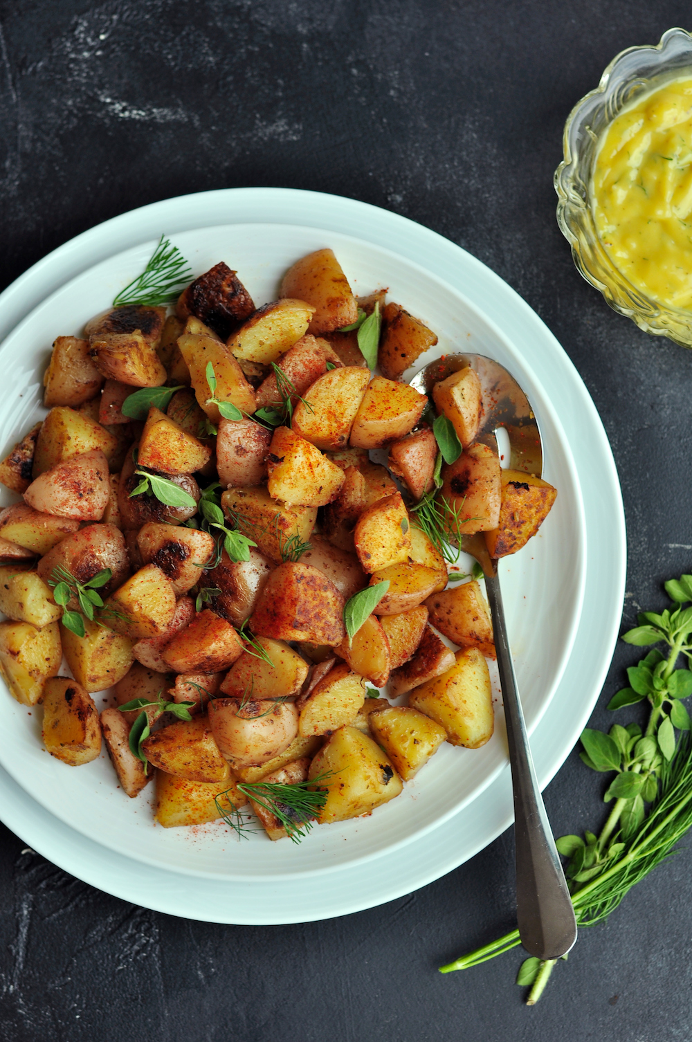 Crispy-skinned sous vide potatoes cooked with garlic-infused oil and smoked paprika. In the unlikely event that you have leftovers, think potato salad.