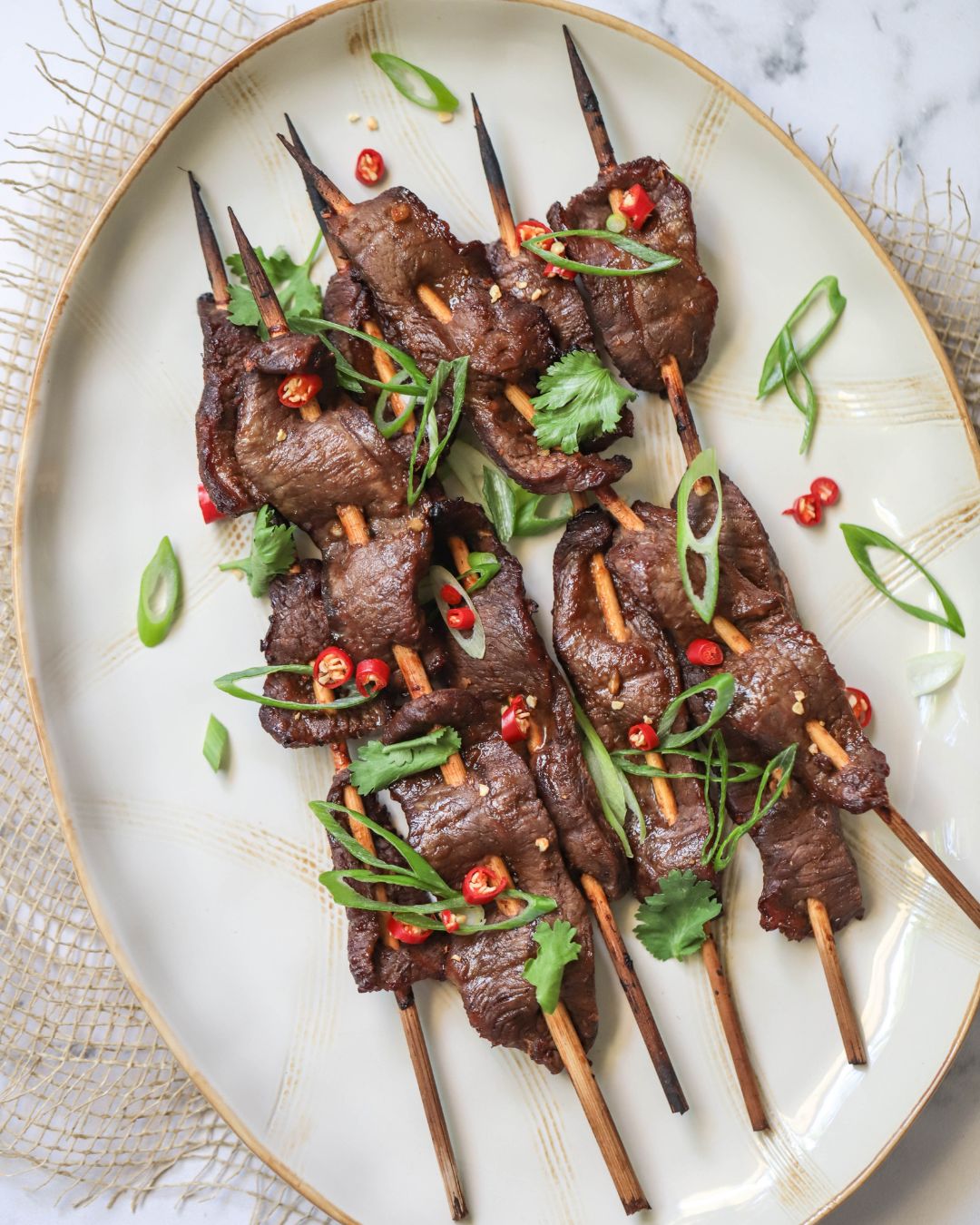 Make juicy ginger beef skewers with a sweet-savory marinade of tamari, garlic, and fresh ginger. Ready in 20 minutes — perfect for your next grill night.
