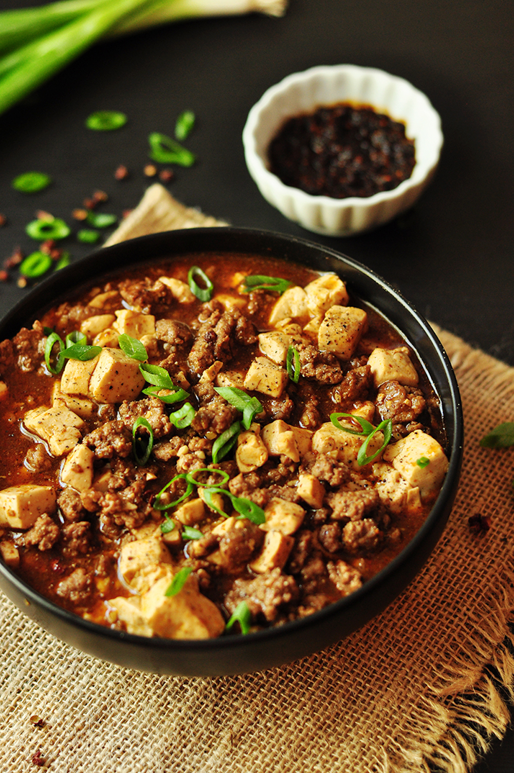 Traditional Mapo Tofu made easy and gluten-free with homemade hot chili oil and pepper solids, then simmered in hearty bone broth!