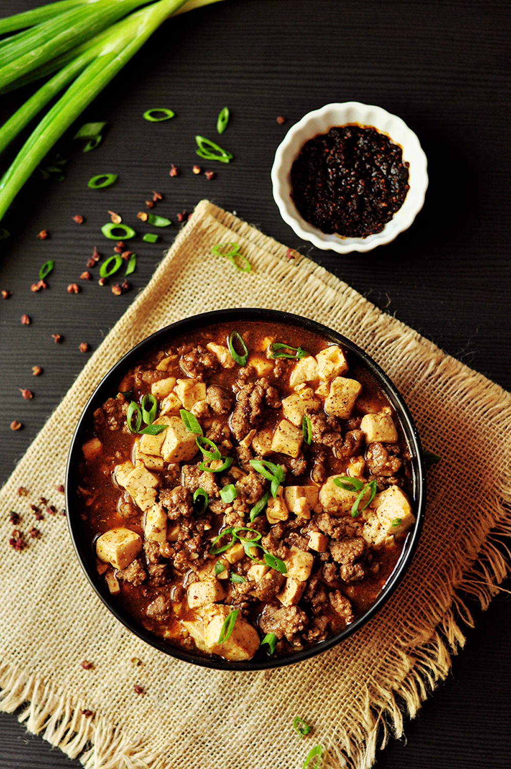 Traditional Mapo Tofu made easy and gluten-free with homemade hot chili oil and pepper solids, then simmered in hearty bone broth!