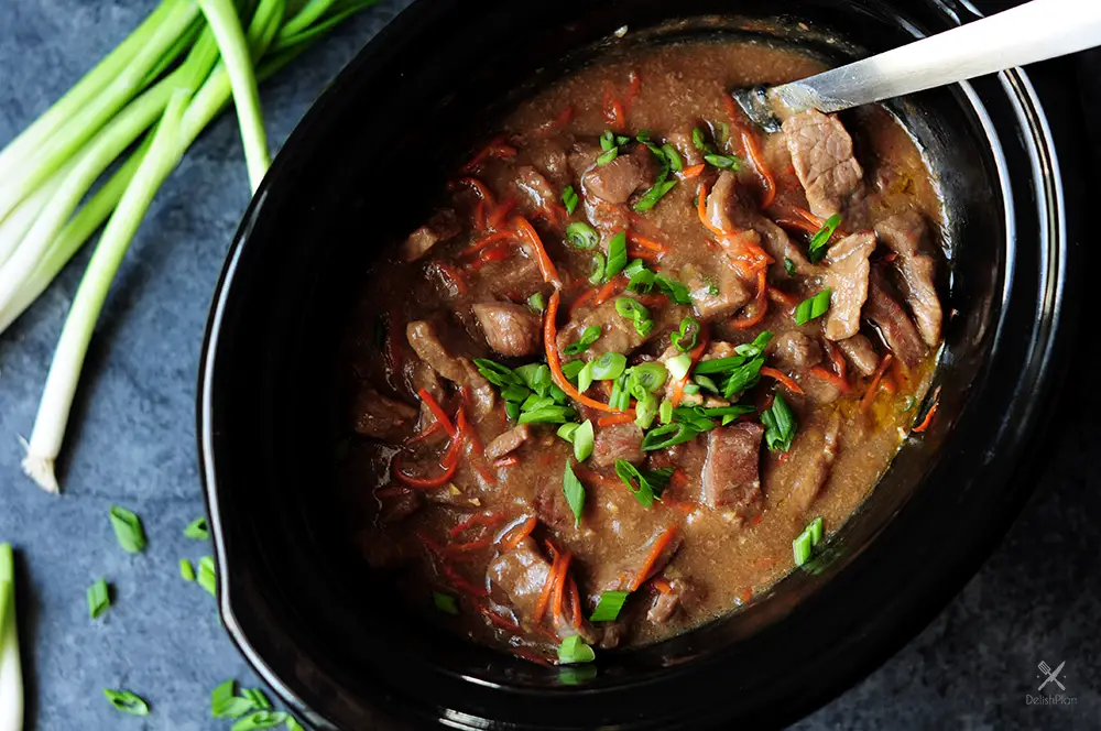 Mongolian beef recipe made gluten free in a slow cooker! This is a perfect recipe for slow cooker beginners or for those who just want a simple dump meal.