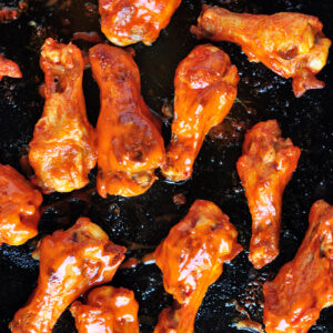 These buffalo-style grilled chicken wings take 20 minutes on the grill and they are finger lickin' good! You can also broil them in the oven.