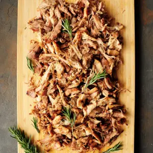 Sous vide pork shoulder cooked to fork tender without babysitting. This pulled pork recipe makes any main dish hearty, flavorful, and satisfying.