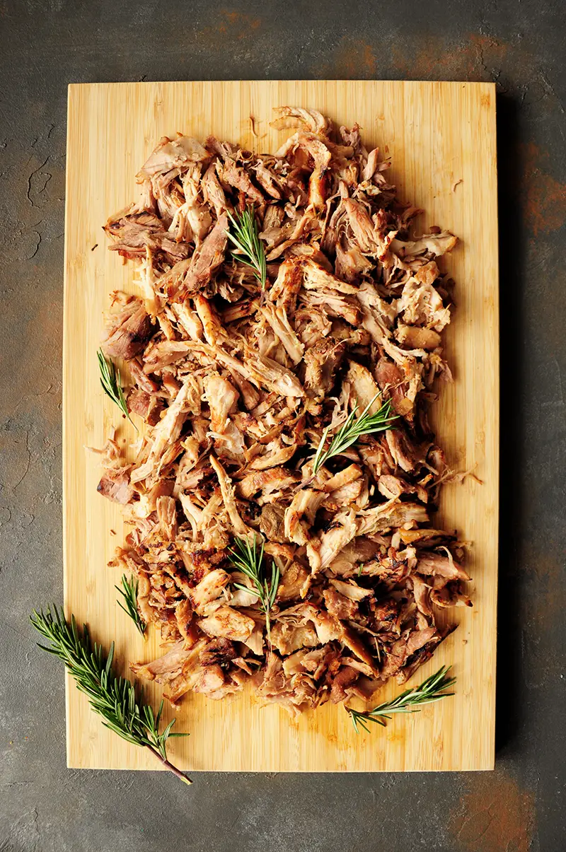 Sous vide pork shoulder cooked to fork tender without babysitting. This pulled pork recipe makes any main dish hearty, flavorful, and satisfying.