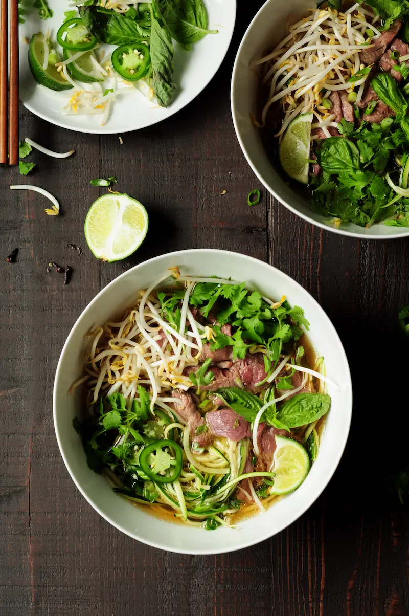 Learn how to make pho with zucchini noodles and bone broth in just 30 minutes. Once you have learned the technique, you'll want to make pho ALL THE TIME. 