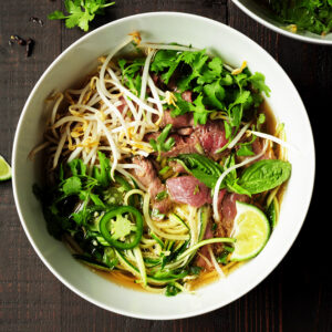 Learn how to make pho with zucchini noodles and bone broth in just 30 minutes.