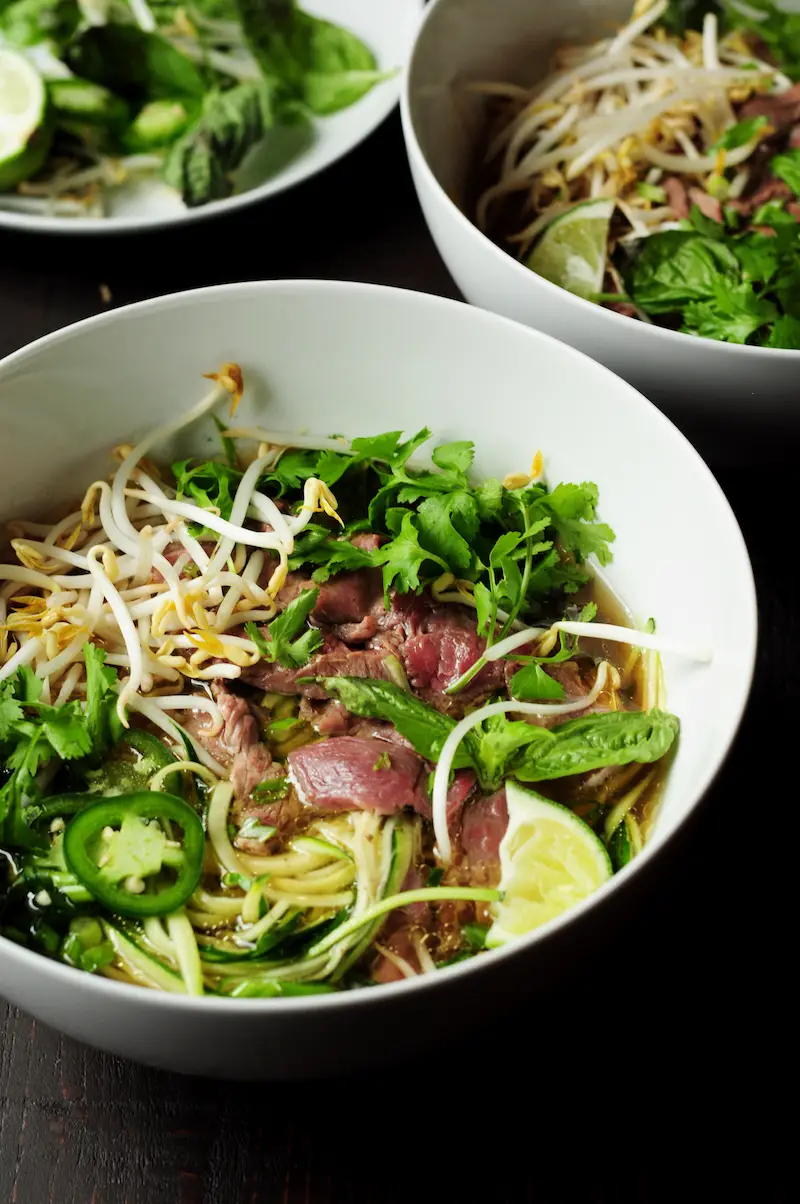 Learn how to make pho with zucchini noodles and bone broth in just 30 minutes. Once you have learned the technique, you'll want to make pho ALL THE TIME. 