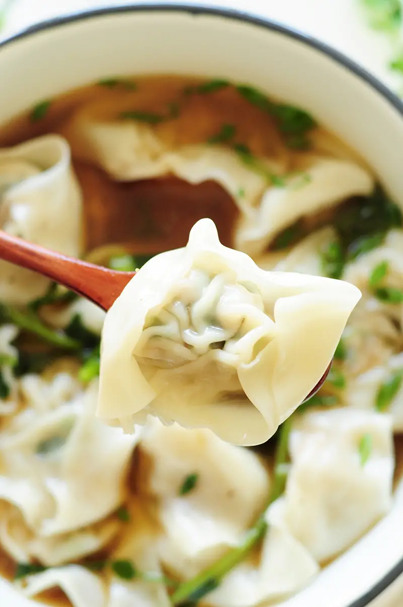 A step-by-step guide to homemade wonton soup, one of the heartiest Chinese comfort foods. It’s also a fantastic, healthy freezer meal for a whole family.