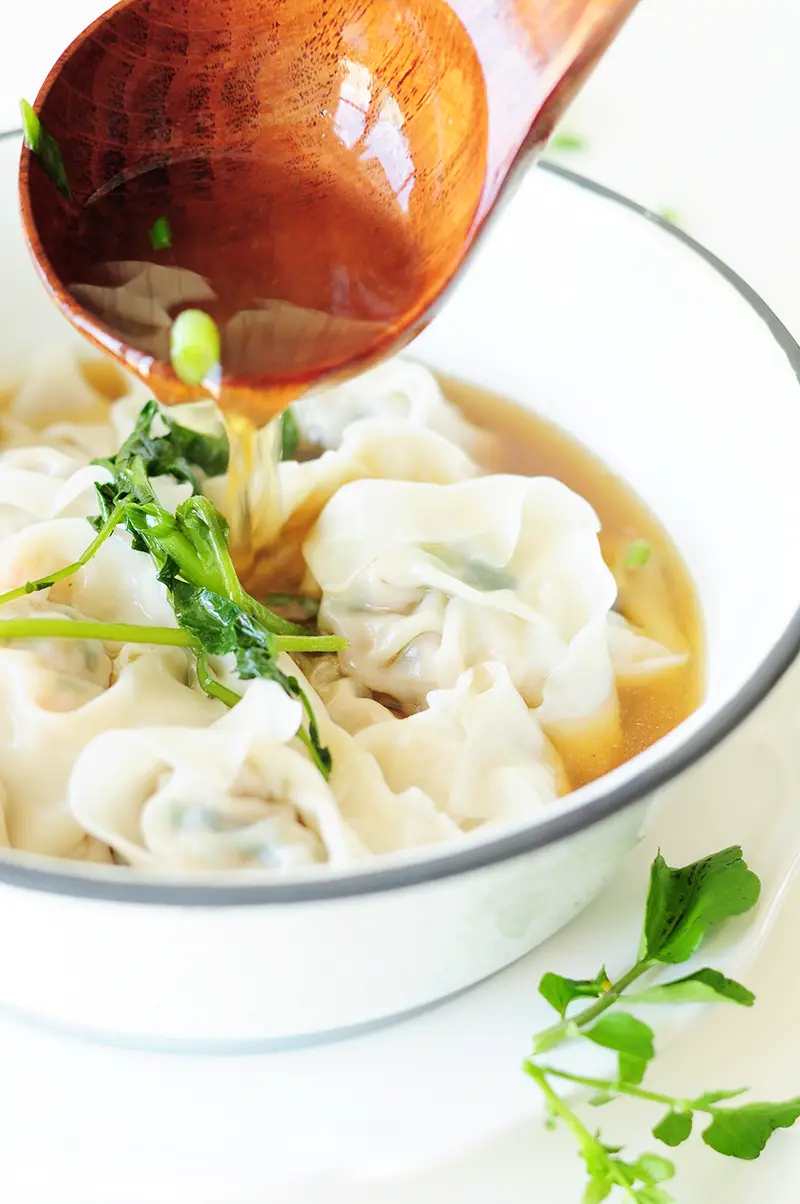 A step-by-step guide to homemade wonton soup, one of the heartiest Chinese comfort foods. It’s also a fantastic, healthy freezer meal for a whole family.