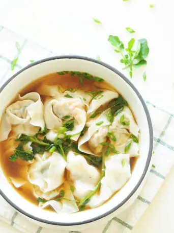 A step-by-step guide to homemade wonton soup, one of the heartiest Chinese comfort foods. It’s also a fantastic, healthy freezer meal for a whole family.