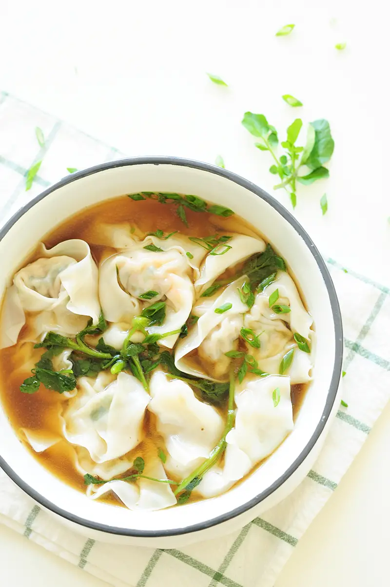 A step-by-step guide to homemade wonton soup, one of the heartiest Chinese comfort foods. It’s also a fantastic, healthy freezer meal for a whole family.