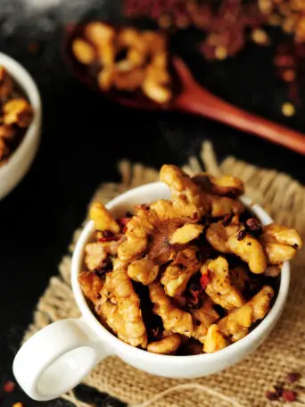 Two easy methods to show you how to toast walnuts, or any nuts, plus a recipe for a spicy and delicious Szechuan-style toasted walnuts.