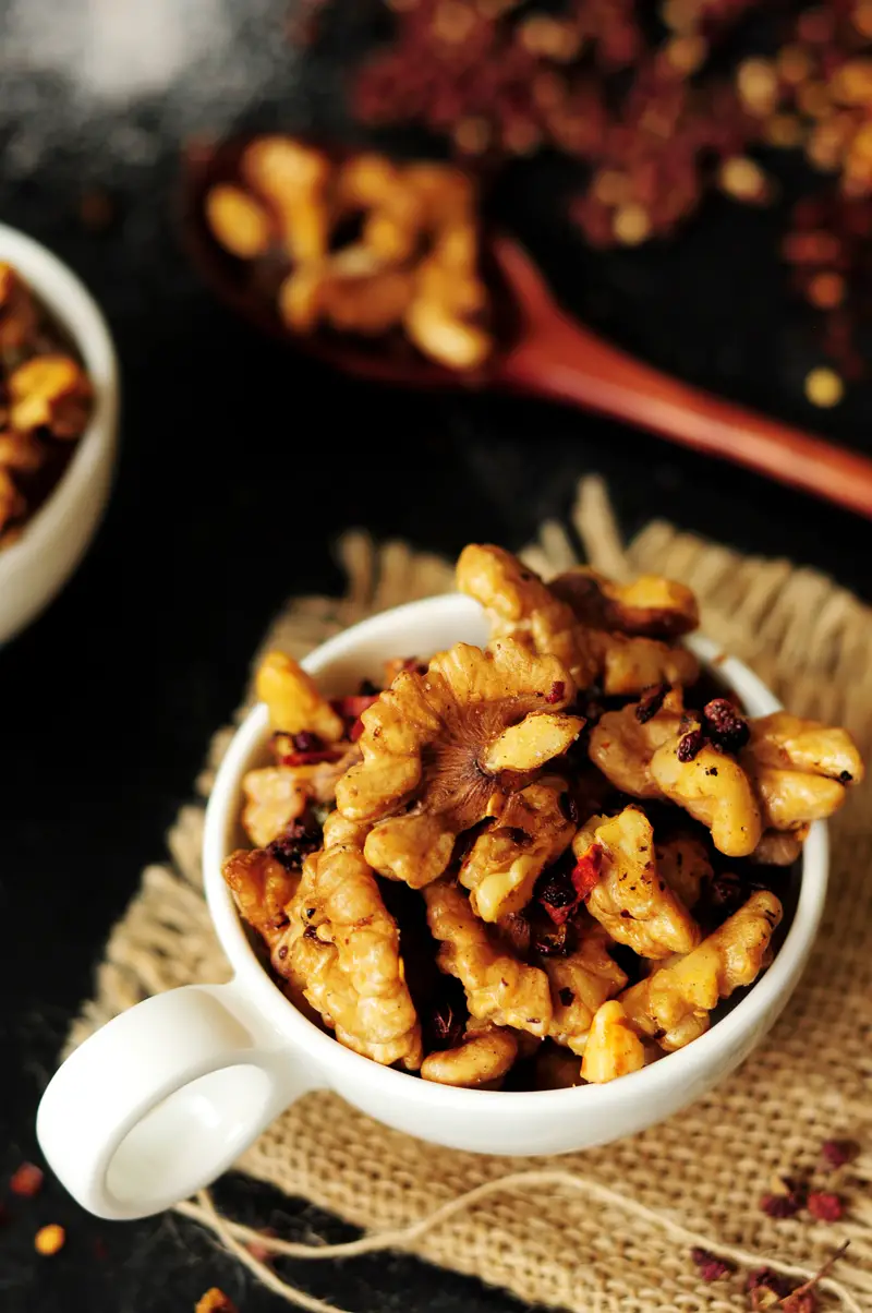 Two easy methods to show you how to toast walnuts, or any nuts, plus a recipe for a spicy and delicious Szechuan-style toasted walnuts.