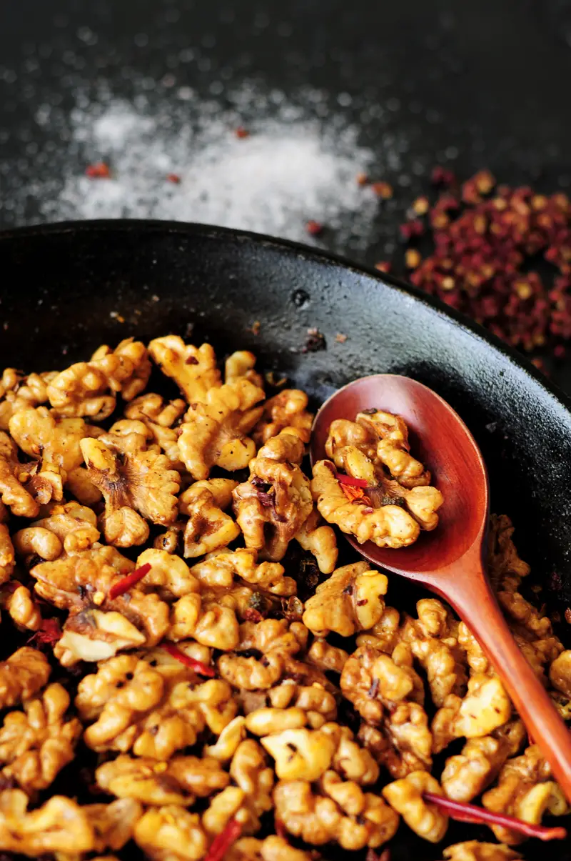 Two easy methods to show you how to toast walnuts, or any nuts, plus a recipe for a spicy and delicious Szechuan-style toasted walnuts.