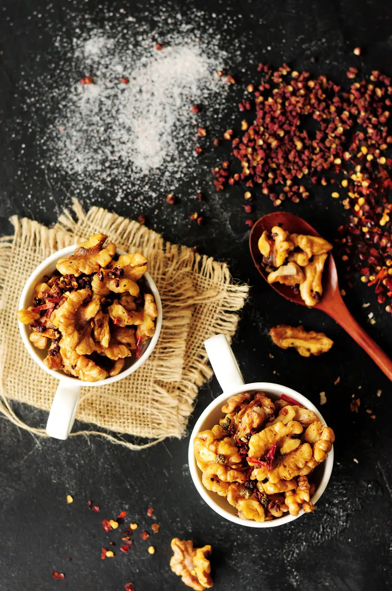 Two easy methods to show you how to toast walnuts, or any nuts, plus a recipe for a spicy and delicious Szechuan-style toasted walnuts.